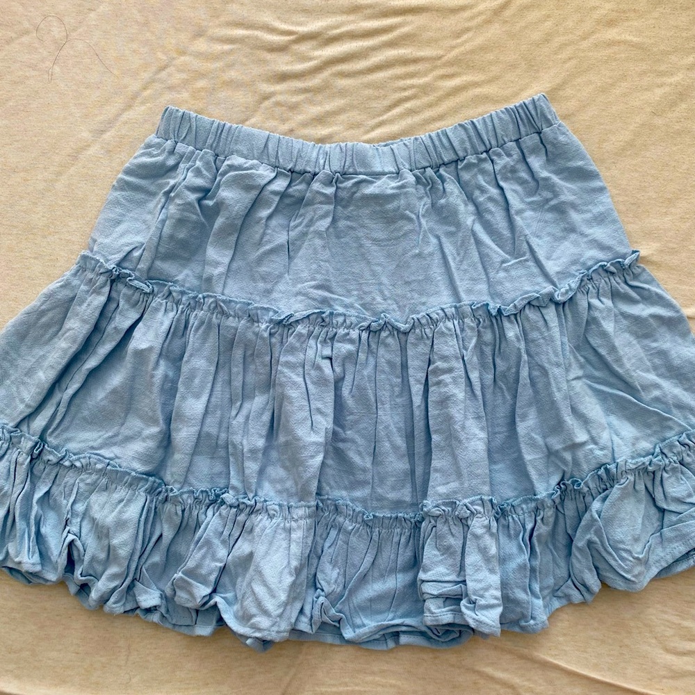 Princess Polly blue skirt size 8, never worn! In new condition.